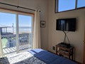 queen bedroom with 2nd floor deck